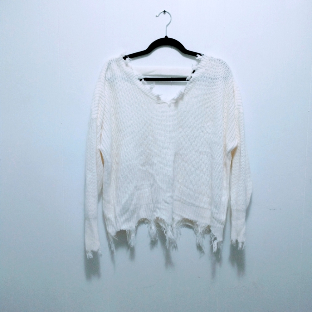 Distressed cropped sweater